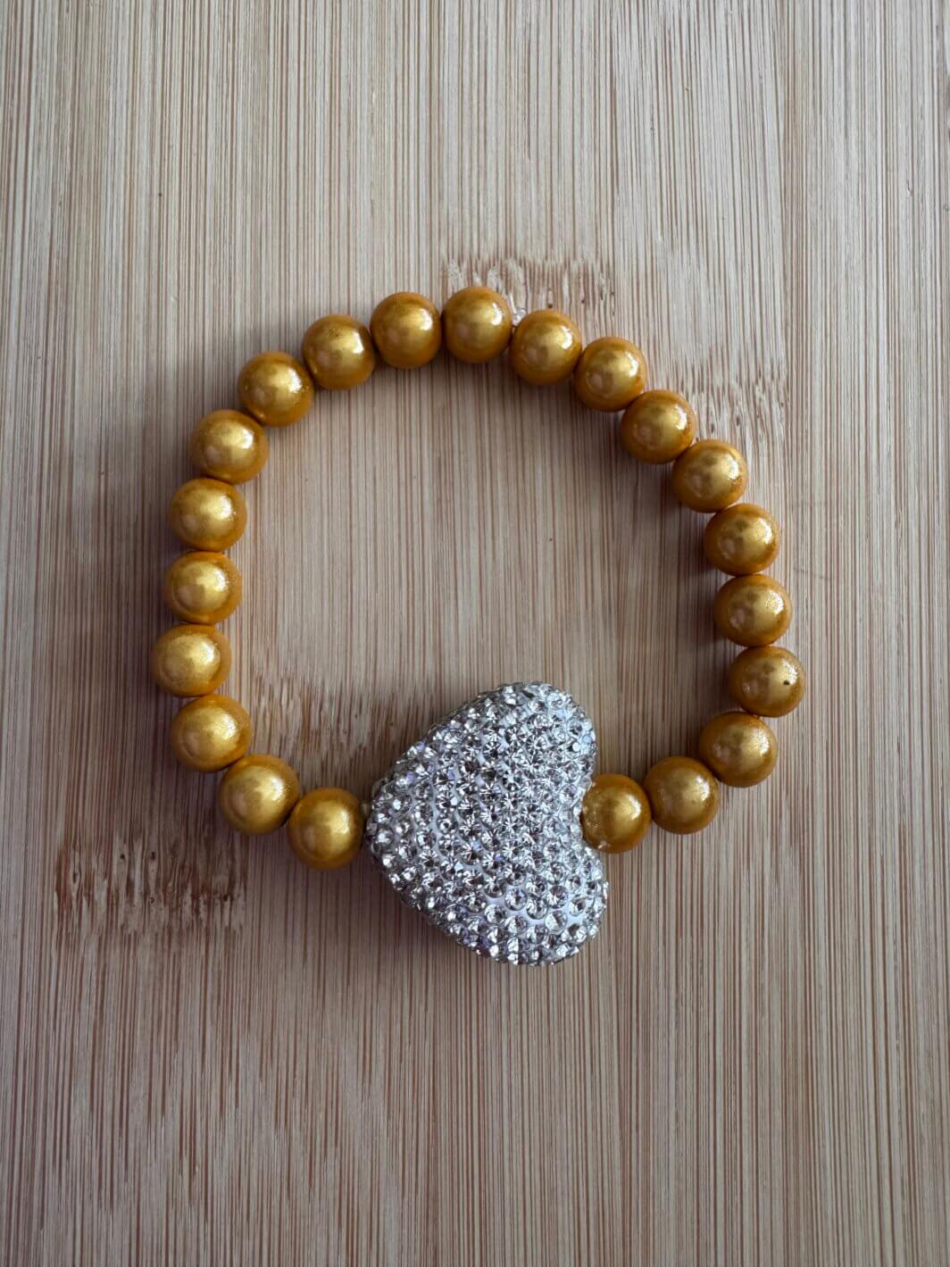 MenaMountain Armband sonnengelb silbernes Herz