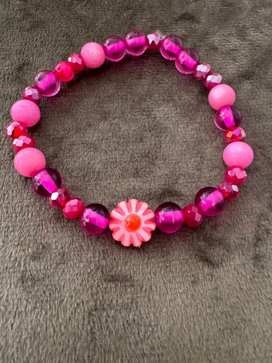 MenaMountain Armband pink Blume Gänseblümchen